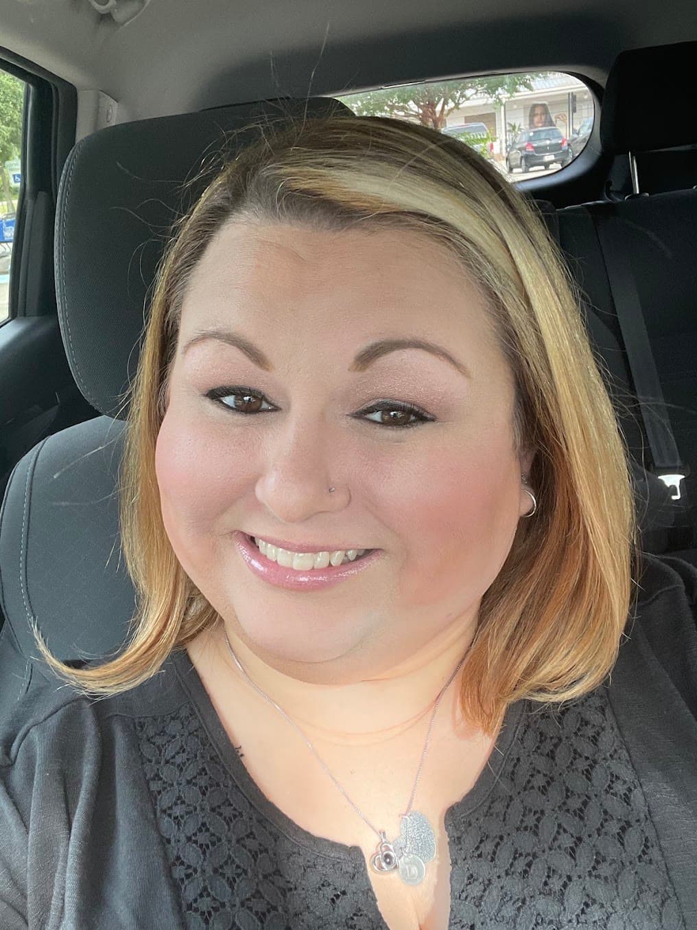 A member of the Small Talk Salon team
